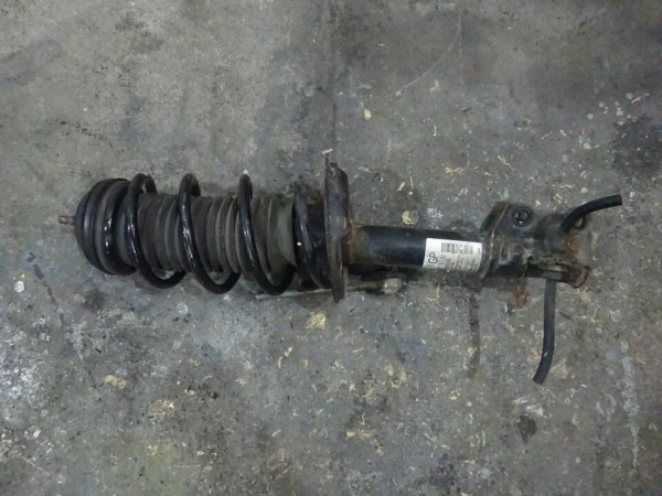 Opel Corsa D Federbein Links stosstämpfer Fahrerseite